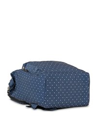 Bolsa de tela azul marino con lunares blancos, de forma rectangular, cierre con cremallera y asa lateral. Superficie texturizada para un mejor agarre.
