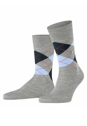 Graue Socken mit einemArgyle-Muster in Marineblau, Hellblau und roten Akzenten. Hergestellt aus weichem Material mit einem gerippten Bund.