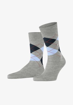 Calze grigie con un motivo argyle e accenti in blu navy, blu chiaro e rosso. Realizzate in materiale morbido con un polsino a coste.