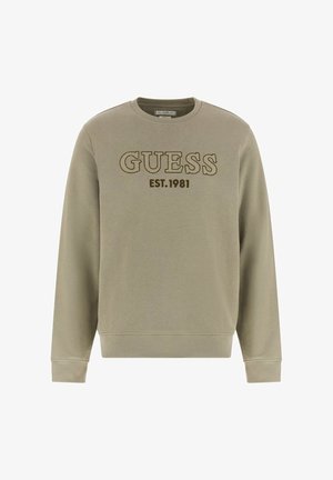 Olive roheline dressipluus ümmarguse kaelusega, ribatega varrukad ja helkiv serv, millel on kontrastsetes pruunides tekstuursetes tähtedes "GUESS EST.1981".