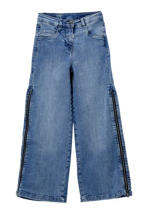 Jeans in denim blu a gamba larga cropped con tasche frontali e cerniere nere che corrono verticalmente lungo le gambe esterne.