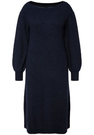 Vestido de punto en azul marino oscuro, con un escote amplio, mangas largas abullonadas y aberturas laterales. Textura suave con un ajuste relajado.