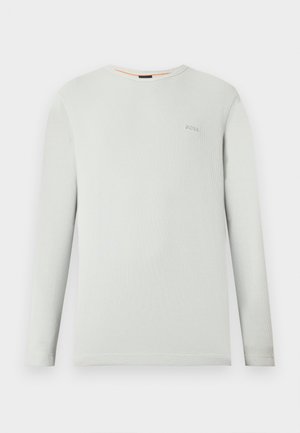 Light grey long-sleeve shirt made of textured fabric, featuring a round neckline and a small logo on the left chest.