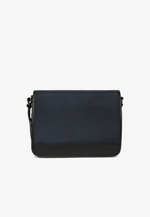 Navy messenger bag featuring a textured fabric, black leather accents, rectangular shape, and an adjustable shoulder strap.