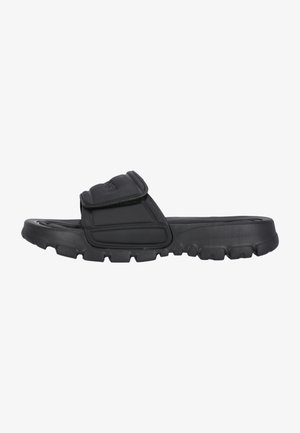 Black rubber slide sandal with wide strap and textured surface, featuring a molded sole with grooves for traction and durability.