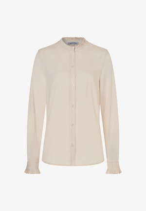 Light beige long-sleeve button-up shirt with a mandarin collar, pleated detail at collar and cuffs, and a smooth texture.