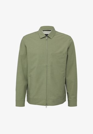Veste vert olive en tissu texturé, avec une fermeture éclair sur le devant, un col montant et une poche poitrine accompagnée de poches latérales.