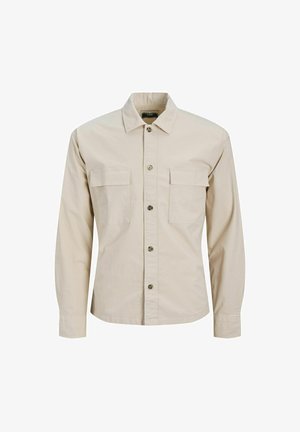 Beige Langarmhemd aus Baumwolle mit Kragen, Knopfleiste und zwei Brusttaschen mit Klappen.