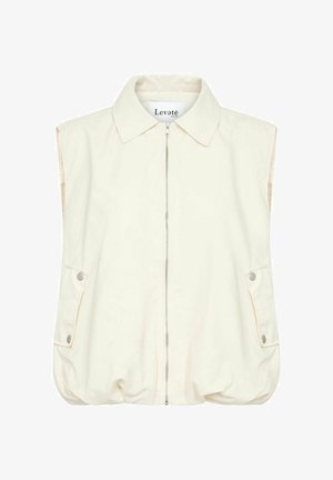 Vesta fără mâneci de culoare crem, cu guler, fermoar frontal și două buzunare laterale. Material moale cu o margine inferioară ușor plisată.