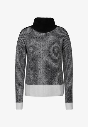 Pull en tricot noir et gris avec un col roulé haut, une texture côtelée, des manches longues et un bas de band contrasté blanc.