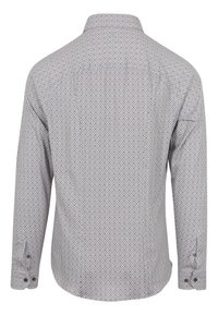 Langarmshirt van lichtgewicht stof met een geometrisch patroon in grijs, rood en blauw; heeft een knoopsluiting bij de kraag en knopen bij de manchetten.