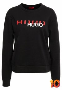 Felpa nera con collo a giro, maniche lunghe, presenta una grande scritta rossa e bianca "HUGO" sul davanti, realizzata in tessuto morbido.