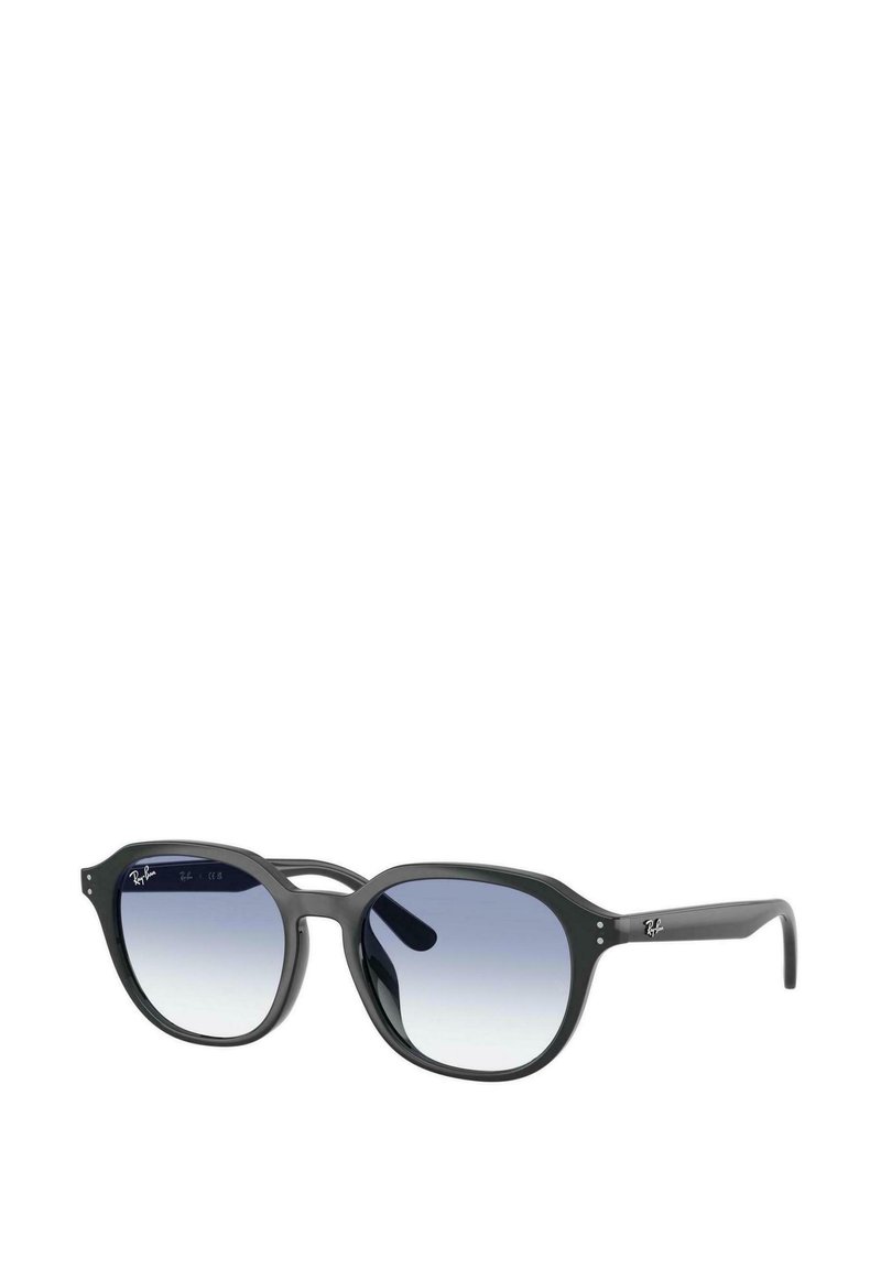 Occhiali da sole oversize neri con lenti blu sfumate, dotati di una montatura spessa e bordi arrotondati, impreziositi da un piccolo logo sul lato.