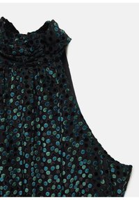 Schwarzes Stoffoberteil mit einem Cowl-Ausschnitt, das ein Muster aus glänzenden türkis- und grünen runden Punkten aufweist. Weiche Textur mit einem drapierten Design.