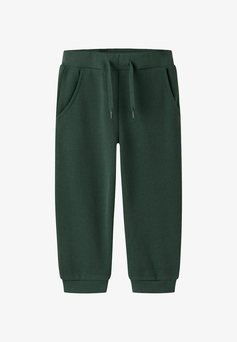 Tumši zaļi, riboti sporta bikses ar elastīgu jostu, auklu un sānu kabatām. Potīšu aproces; ikdienišķs un ērts dizains.