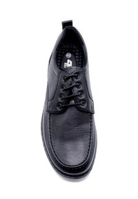 Chaussure en cuir noir avec un design à lacets, bout arrondi, détails de coutures subtils et doublure intérieure texturée. Taille 42 indiquée à l'intérieur.