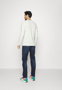 Tommy Hilfiger STRETCH SLIM FIT - Camisola de manga comprida - ivory