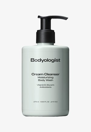 Hellgrüne Flasche mit schwarzem Pumpenkopf, beschriftet mit "Bodyologist Cream Cleanser Moisturizing Body Wash", 275 ml, listet die Inhaltsstoffe und den pH-Wert auf.