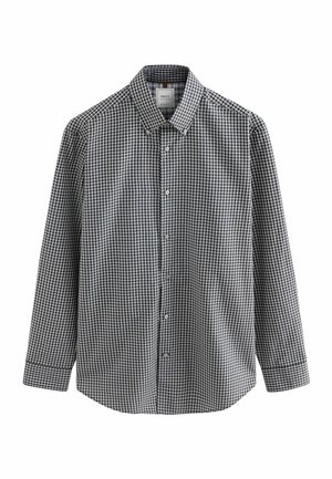 Black and white checkered long-sleeve shirt, featuring a button-down collar, front buttons, and a straight hem. Made from woven fabric.
