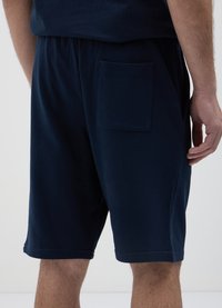 Calliope GINNICO - Pantaloni sportivi - blu