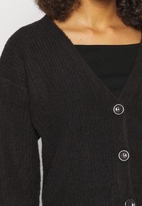 NA-KD Chaqueta de punto - black