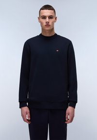 Marineblauwe crewneck sweatshirt van zachte stof, met ribben bij de mouwen en onderkant, versierd met een klein logo op de borst.
