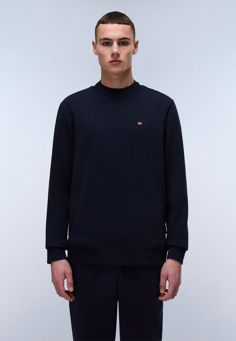 Marineblauwe crewneck sweatshirt van zachte stof, met ribben bij de mouwen en onderkant, versierd met een klein logo op de borst.