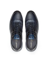 Navy leather sneakers with a textured finish, featuring a lace-up design, rounded toe, and a contrasting logo on the tongue.