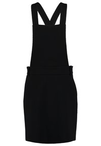 Robe chasuble noire avec de larges bretelles croisées dans le dos, taille cintrée et jupe droite, présentée sur un fond blanc uni.