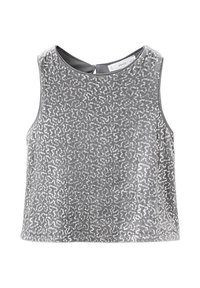 Hopeanvärinen hihaton paita, jossa on teksturoitu kuvio ja hajallaan paljetteja, pyöreä pääntie ja avonainen selkä.