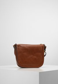 fossil ryder medium