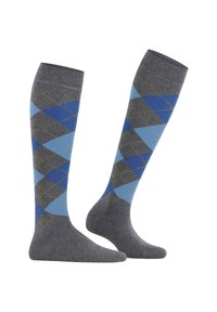 Calze al ginocchio grigie con un motivo argyle blu. Presentano accenti di cucitura gialla. Realizzate in un morbido tessuto elasticizzato per una maggiore comodità.
