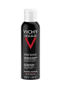 Schwarze Aerosoldose mit einem weißen und roten Etikett, das die Marke "Vichy" und den Produktnamen "Sensi Shave" zeigt, sowie Details zu empfindlicher Haut.