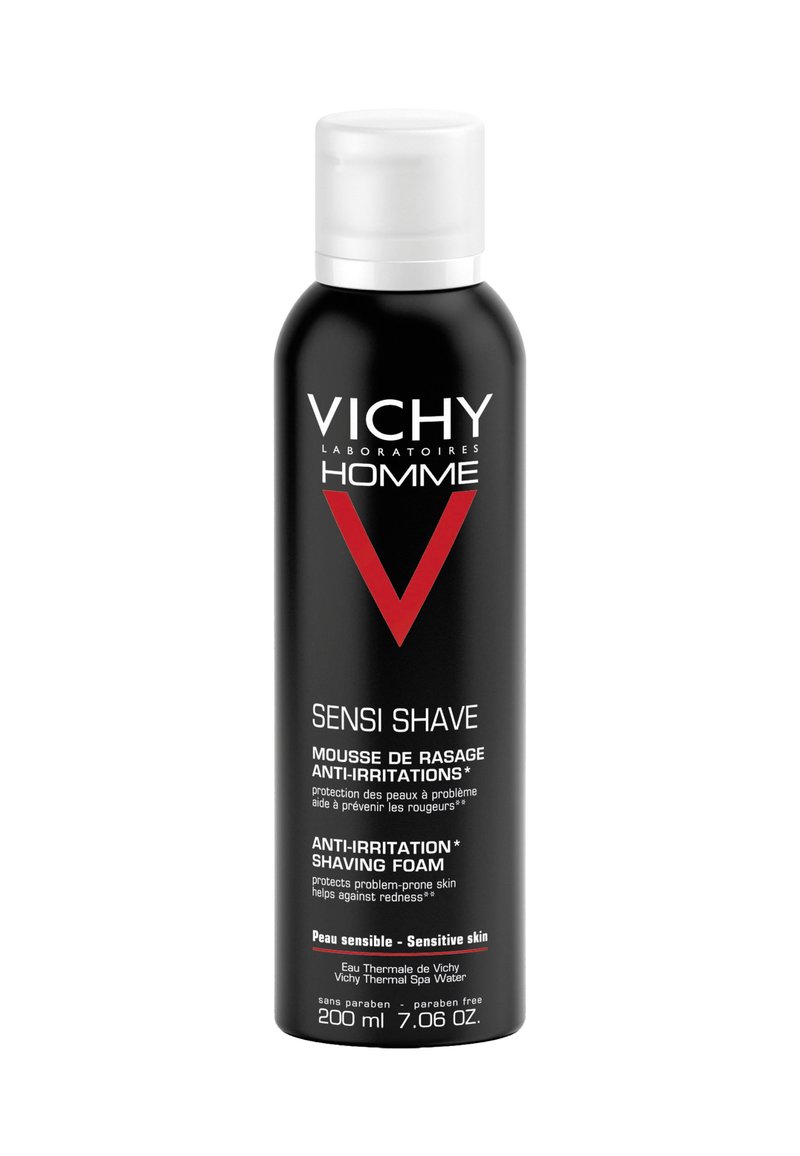 Schwarze Aerosoldose mit einem weißen und roten Etikett, das die Marke "Vichy" und den Produktnamen "Sensi Shave" zeigt, sowie Details zu empfindlicher Haut.