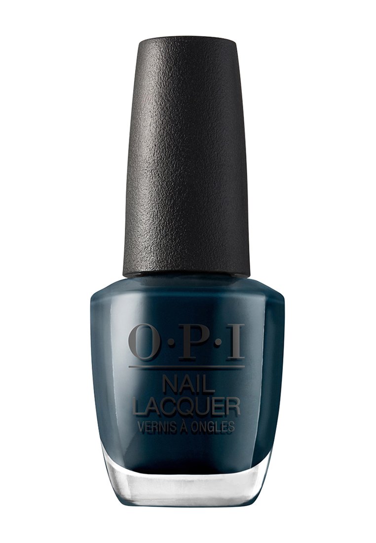 Donkerblauwe nagellak in een helder glazen fles met een getextureerde zwarte dop. Bevat de merknaam en producttype gedrukt aan de voorkant.