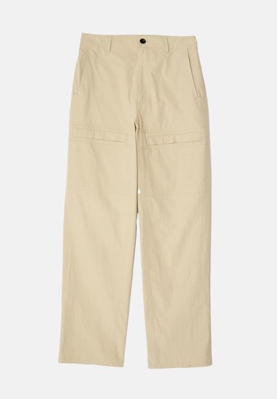 Beige wide-leg trousers made of cotton. Features two front pockets, two back pockets, and a single button closure at the waist.