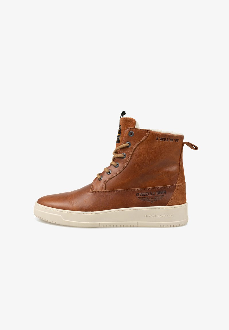 Brown leather high-top sneaker with cream rubber sole, lace-up front, fleece lining, and black text branding on side and upper.