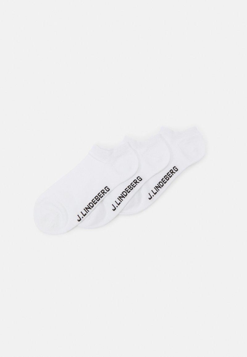White ankle socks made of cotton blend, featuring a black "J. Lindeberg" logo along the side. Smooth texture and rounded toe design.