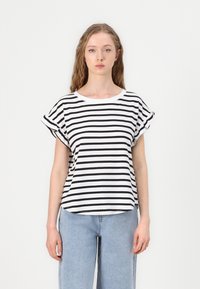 Striped t-shirt in black and white, made of soft fabric. Features a round neckline and rolled short sleeves, with a loose fit and curved hem.