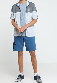 Under Armour Camiseta estampada - grey