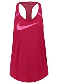 Punainen Nike Dri-FIT hihaton paita, jossa on urheilullinen takaosa, vaaleanpunaisia yksityiskohtia ja iso logo edessä. Sileä kangas.