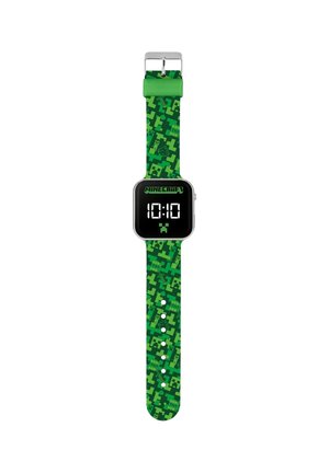 Orologio digitale con cinturino a tema Minecraft pixelato verde, quadrante nero a forma quadrata che mostra l'ora 10:10 e icona Creeper sotto il display.