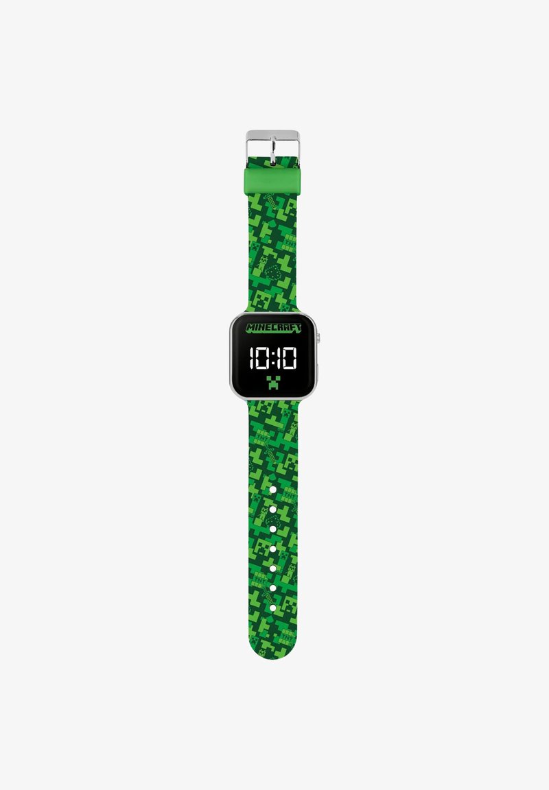 Digitale Uhr mit grünem, pixeliertem Minecraft-Themenarmband, schwarzem quadratischem Ziffernblatt, das die Uhrzeit 10:10 anzeigt, und Creeper-Icon unter dem Display.