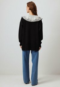 Touché Privé Pullover - black