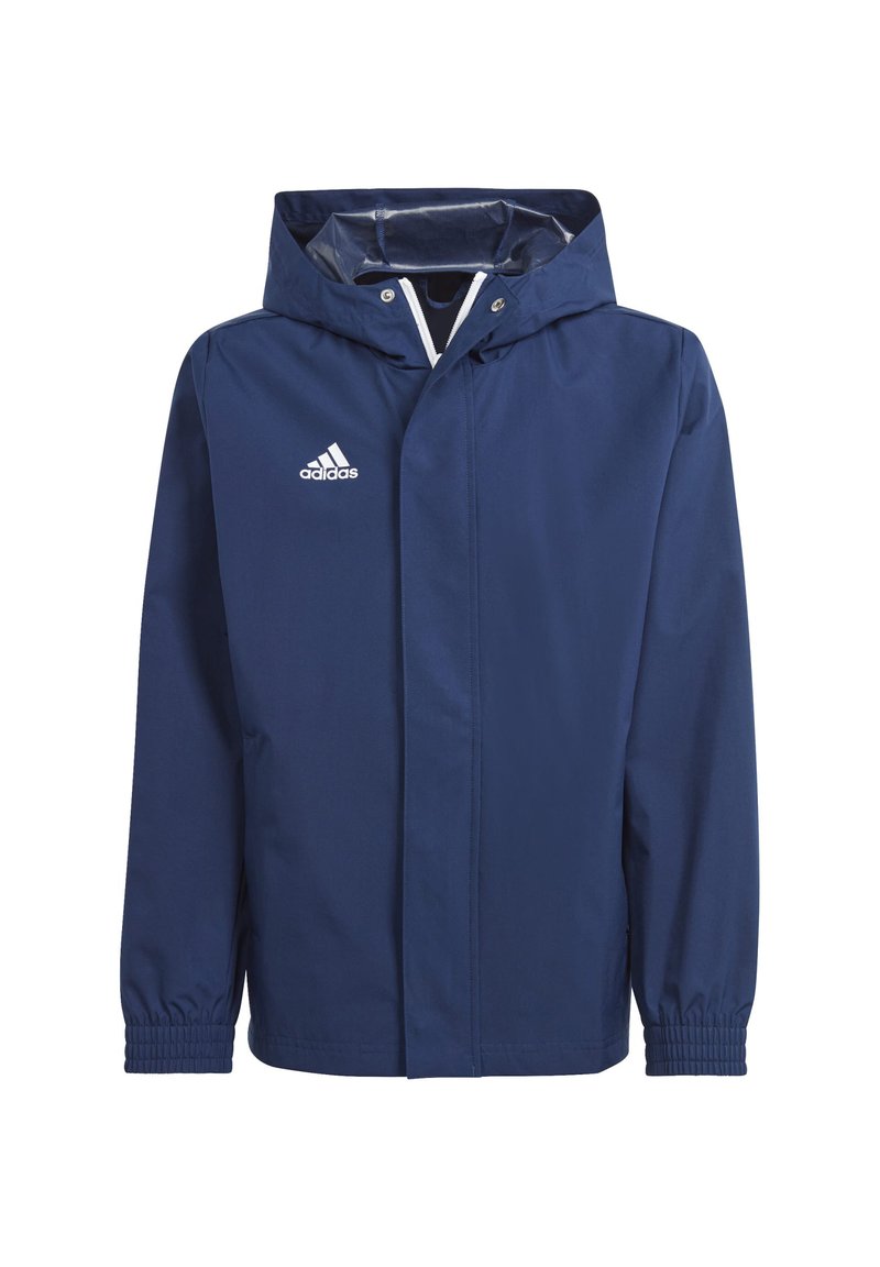 Veste de pluie bleu marine avec capuche, poignets élastiques et logo Adidas blanc sur la poitrine gauche. Tissu lisse et résistant à l'eau.