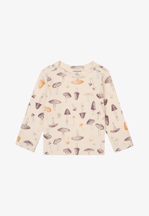 Lange mouwen shirt in crème met een paddenstoelenpatroon in paars en oranje. Voorzien van schouderknopen voor gemakkelijk aankleden; zachte, gestructureerde stof.