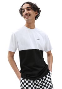 Zwart-witte short-sleeve t-shirt met een verdeeld ontwerp, met het "VANS" logo op de borst. Zachte katoenmaterialen, normale pasvorm.