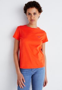 Levi's® Tričko s potlačou - orange