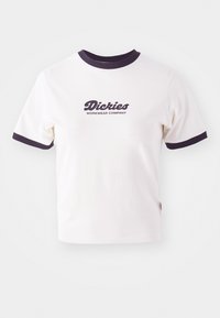 White T-shirt with dark navy ribbed collar and sleeves. Features a large graphic text logo in dark navy, "Dickies WORKWEAR COMPANY."