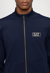 EA7 Emporio Armani Lengva striukė - blue